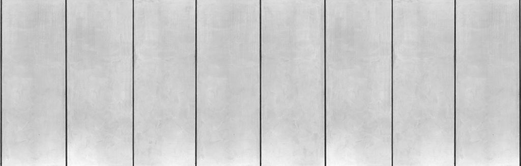 Stukken betonnen muur